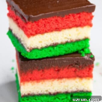 Vibrant Italian Rainbow Almond Delights 5 Stack of Easy Italian Rainbow Cookies (Or Venetians or Neapolitan cookies) on White Background