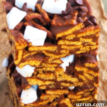 Easy No Bake Smores Bars 6 Stack of Easy No Bake Smores Bars on Brown Parchment Paper.