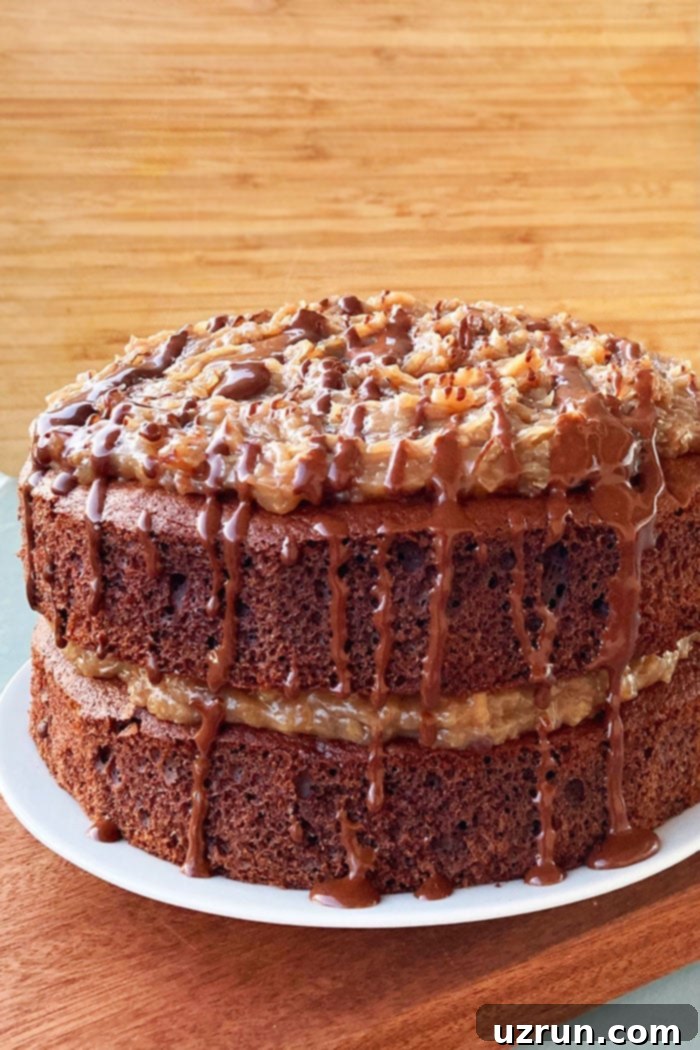 Easy Homemade German Chocolate Cake With Cake Mix on White Plate With Wood Background