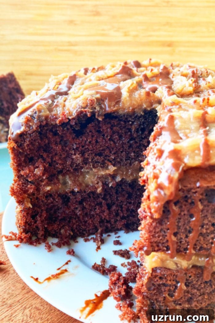 Easy German Chocolate Cake from a Mix 4 Closeup Shot of German Cake with Coconut Pecan Frosting With a Slice Removed