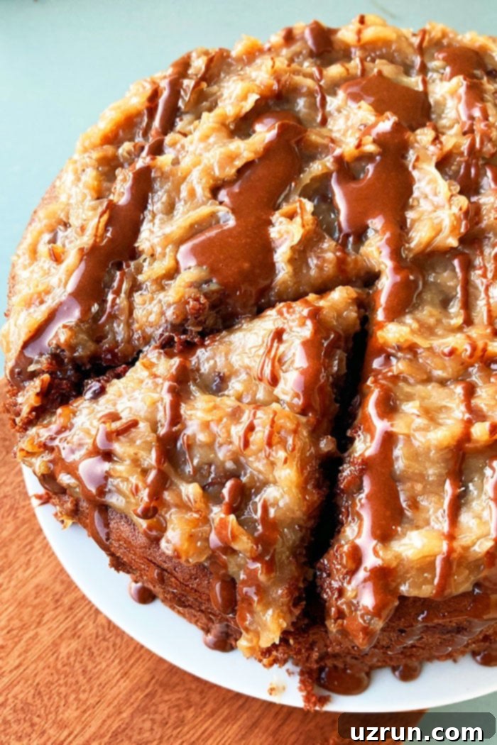 Easy German Chocolate Cake from a Mix 5 Overhead Shot of Traditional Old Fashioned German Chocolate Cake With German Chocolate Icing and Chocolate Ganache on White Plate