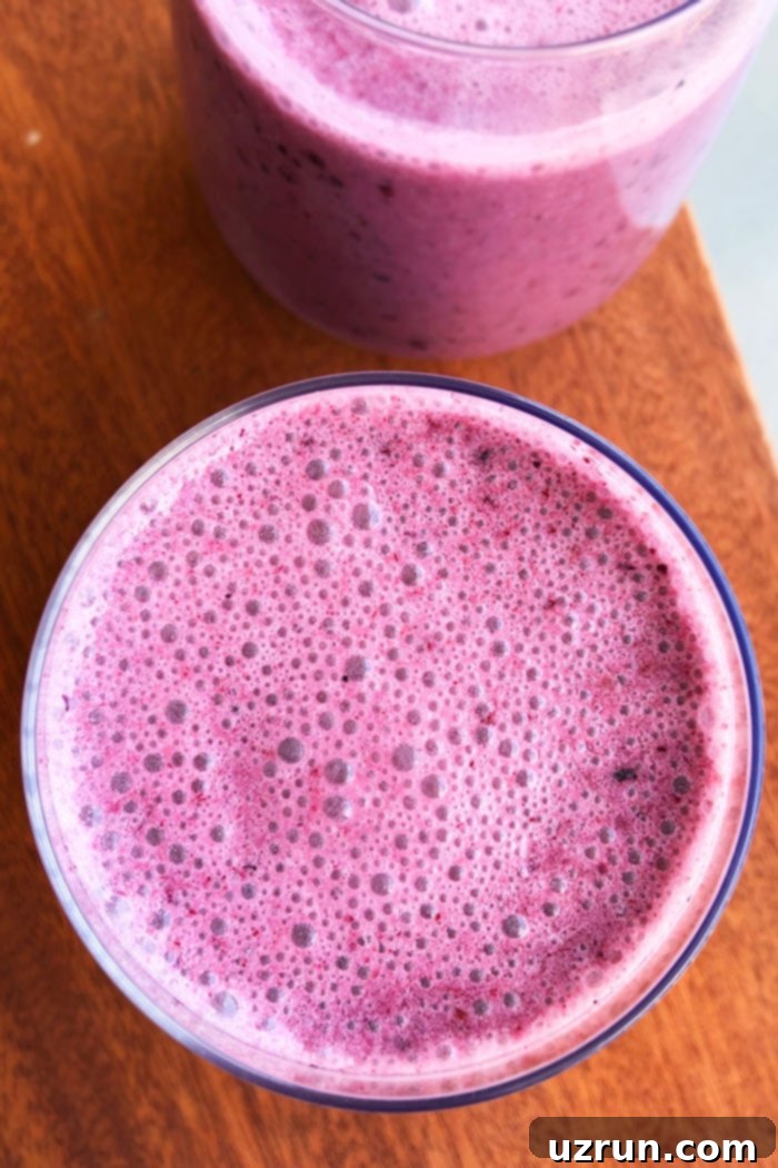 Velvet Blueberry Blend 3 Overhead Shot of Blueberry Banana Smoothie in Clear Cup