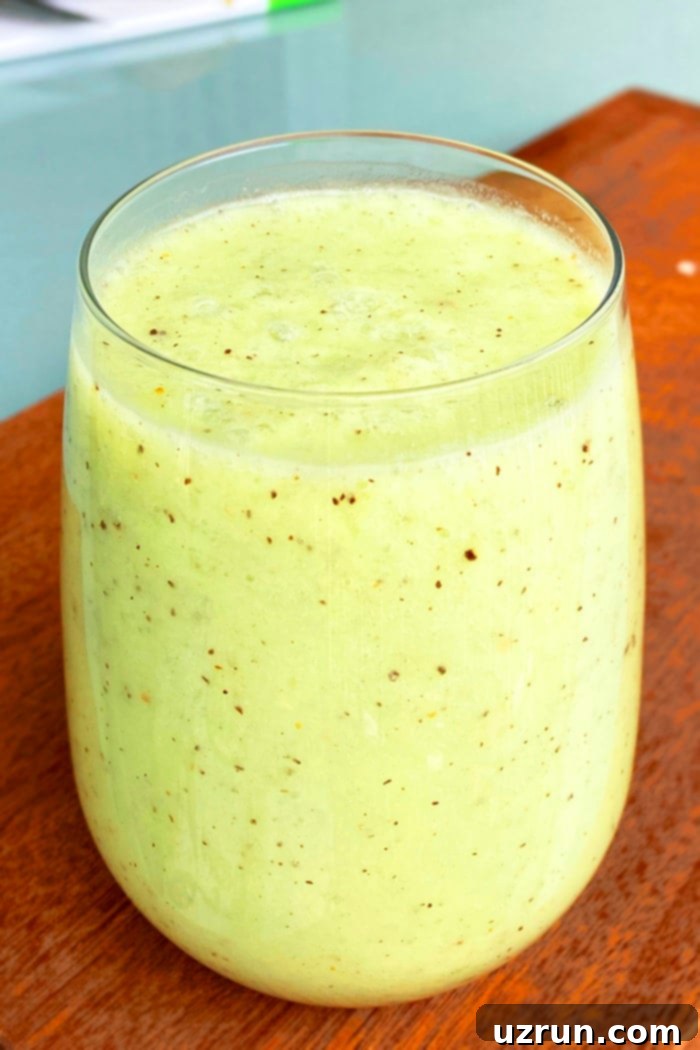 Vibrant Green Kiwi Smoothie in a Clear Glass for a Healthy Breakfast