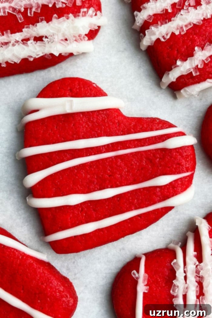 Easy Cake Mix Heart Cookies 4 Cut Out Love Heart Sugar Cookies on White Parchment Paper