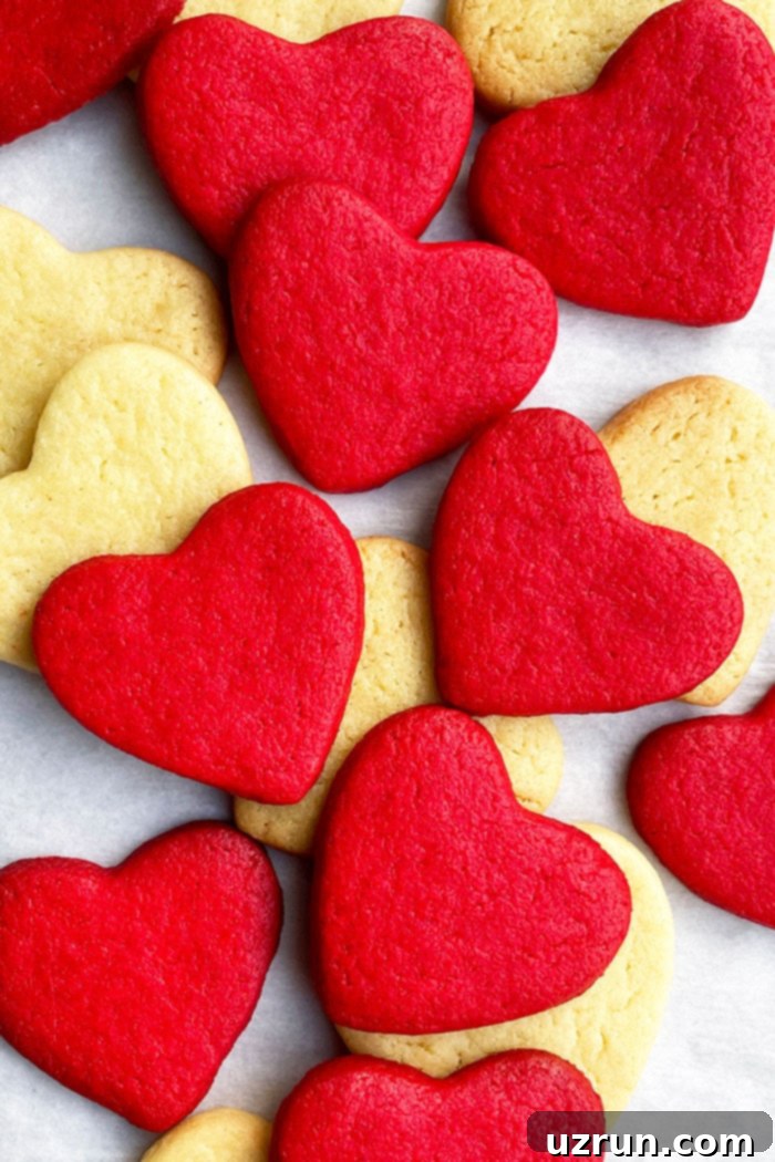 Easy Cake Mix Heart Cookies 5 Overhead Shot of Cake Mix Heart Cookies on White Parchment Paper