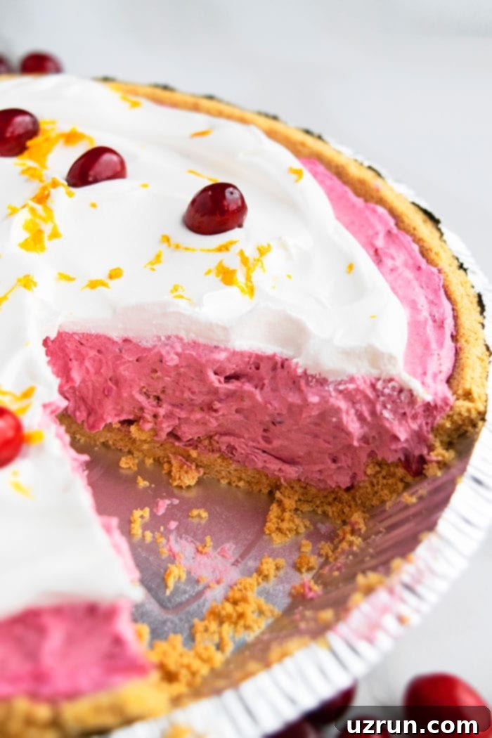 No-Bake Cranberry Delight 4 Close-up of Easy Cranberry Pie in Graham Cracker Crust with Whipped Cream Topping