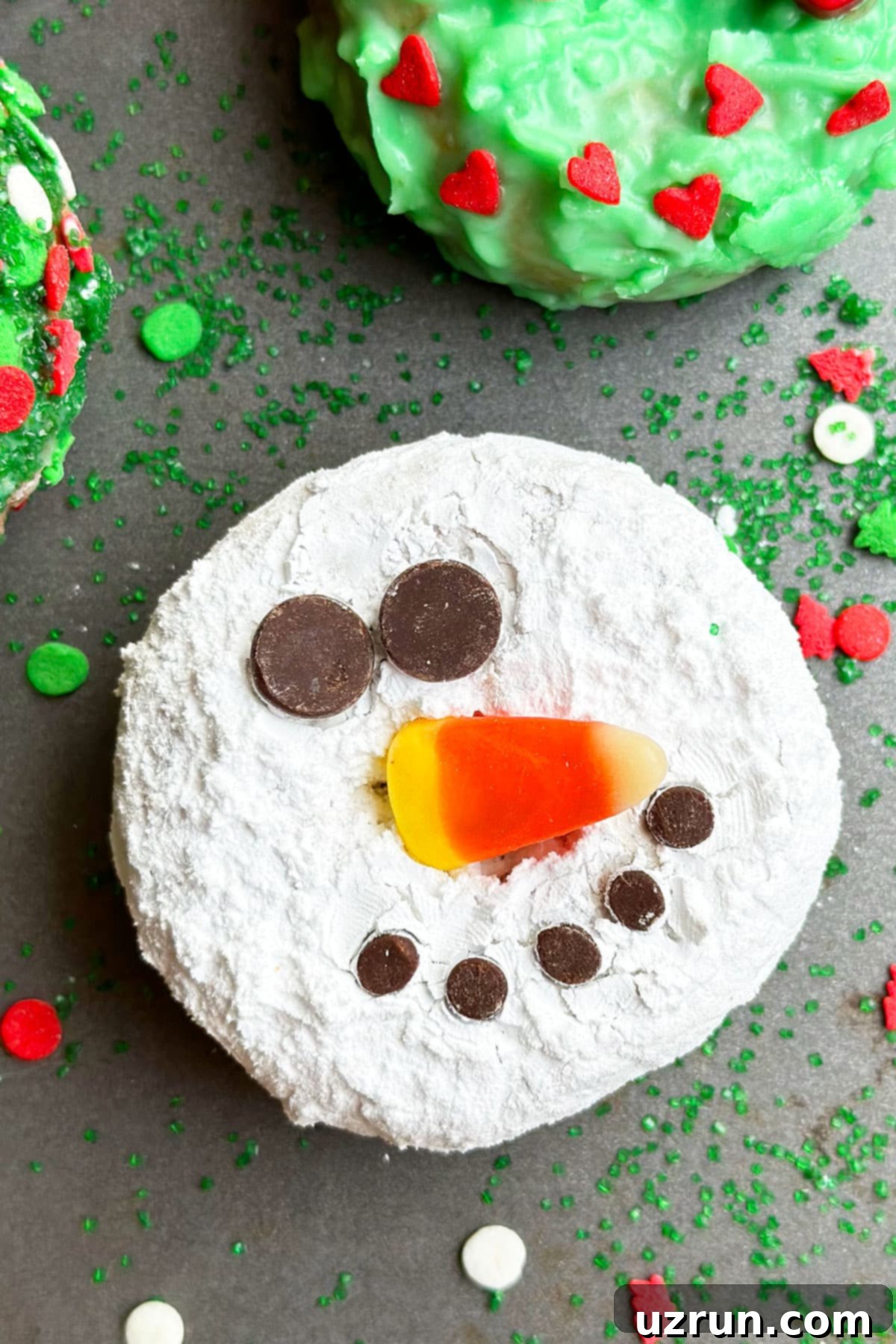 Festive Donut Fun: 6 Easy Designs 9 Easy Snowman Donut on Gray Tray.