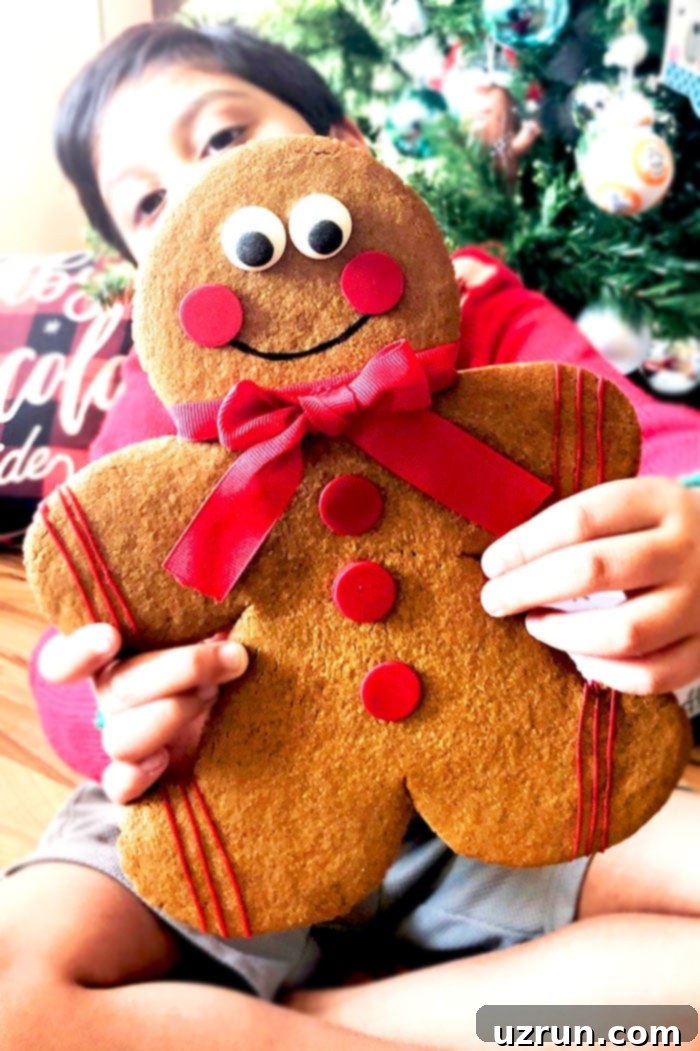 King-Sized Gingerbread Men 6 Kid Holding Jumbo Gingerbread Man Cookie