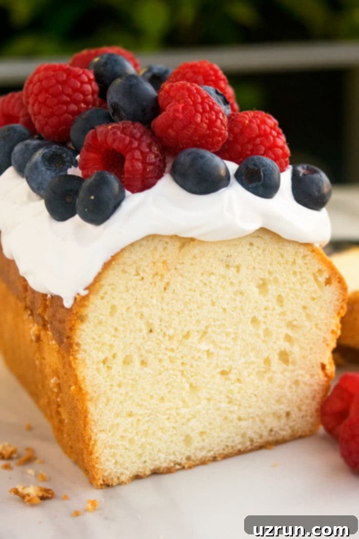 Classic Cream Cheese Pound Cake 4 Best Cream Cheese Pound Cake With Topping of Whipped Cream and Fresh Berries.