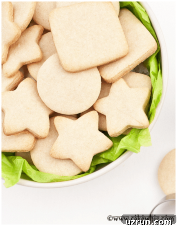 Small Batch of Easy Cut Out Sugar Cookies in White Bowl With Green Liner. 
