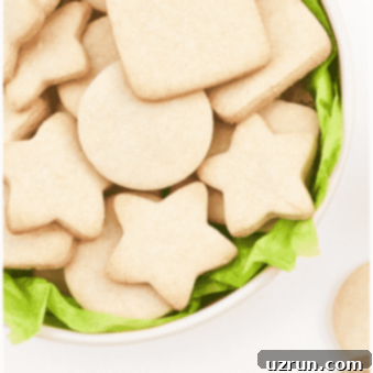 Just-Right Sugar Cookie Bliss 6 Small Batch of Easy Cut Out Sugar Cookies in White Bowl With Green Liner.