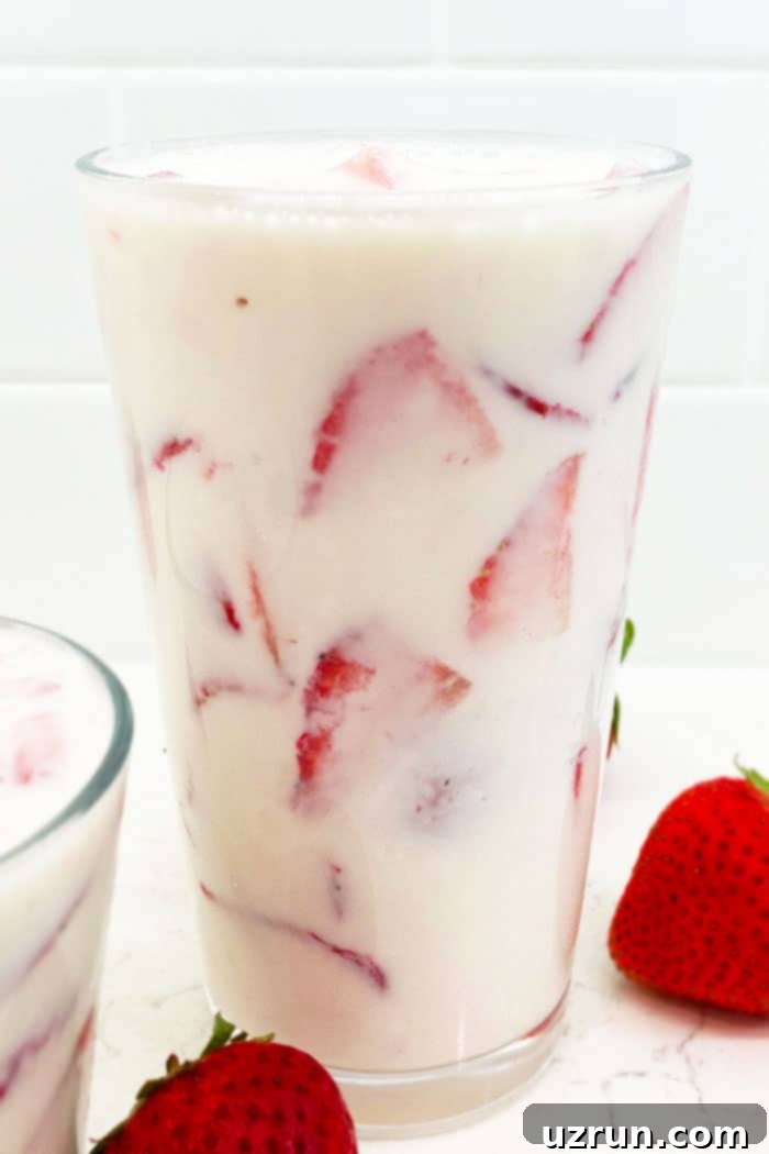 Easy Fresas Con Crema in Glass Cup on White Background 