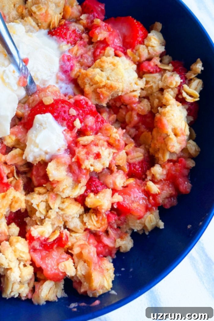 Easy Strawberry Rhubarb Crisp in Blue Bowl