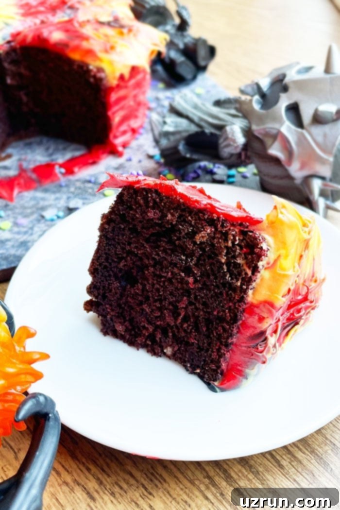 Sauron's Watchful Eye Cake 4 Slice of Chocolate Cake With Red, Yellow, Orange Frosting on White Plate