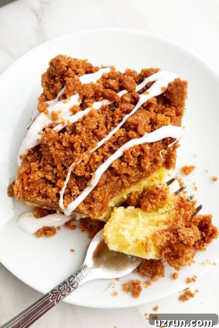 Effortless Cake Mix Crumb Cake 3 Slice of Crumb Coffee Cake in White Plate
