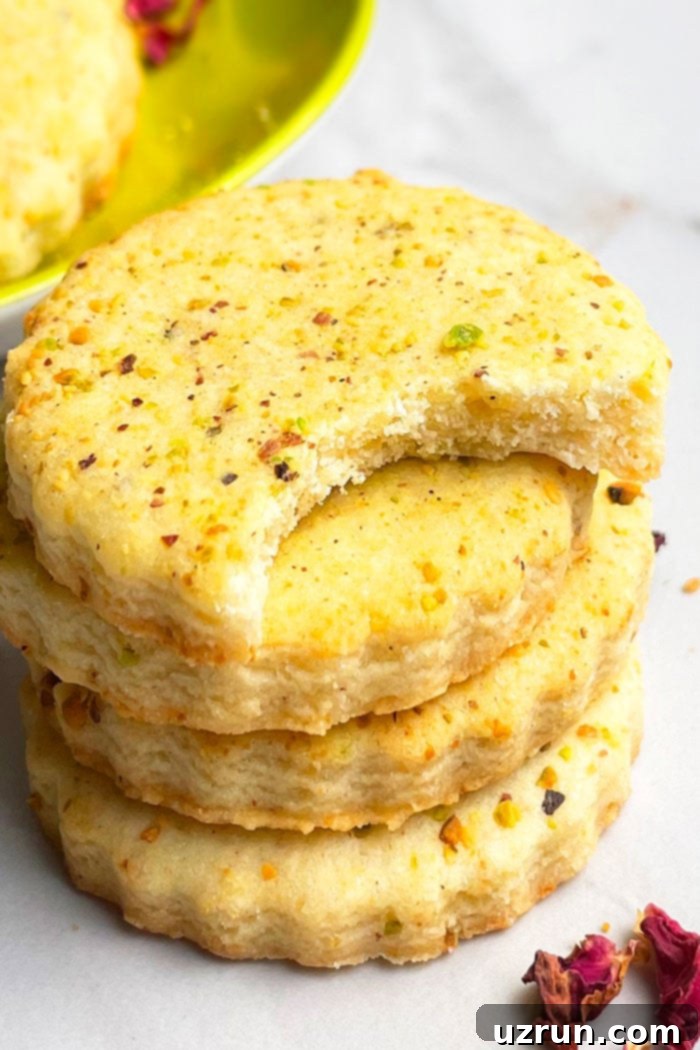Pistachio Cookie Cut-Outs 3 Stack of Homemade Pistachio Biscuits on White Background