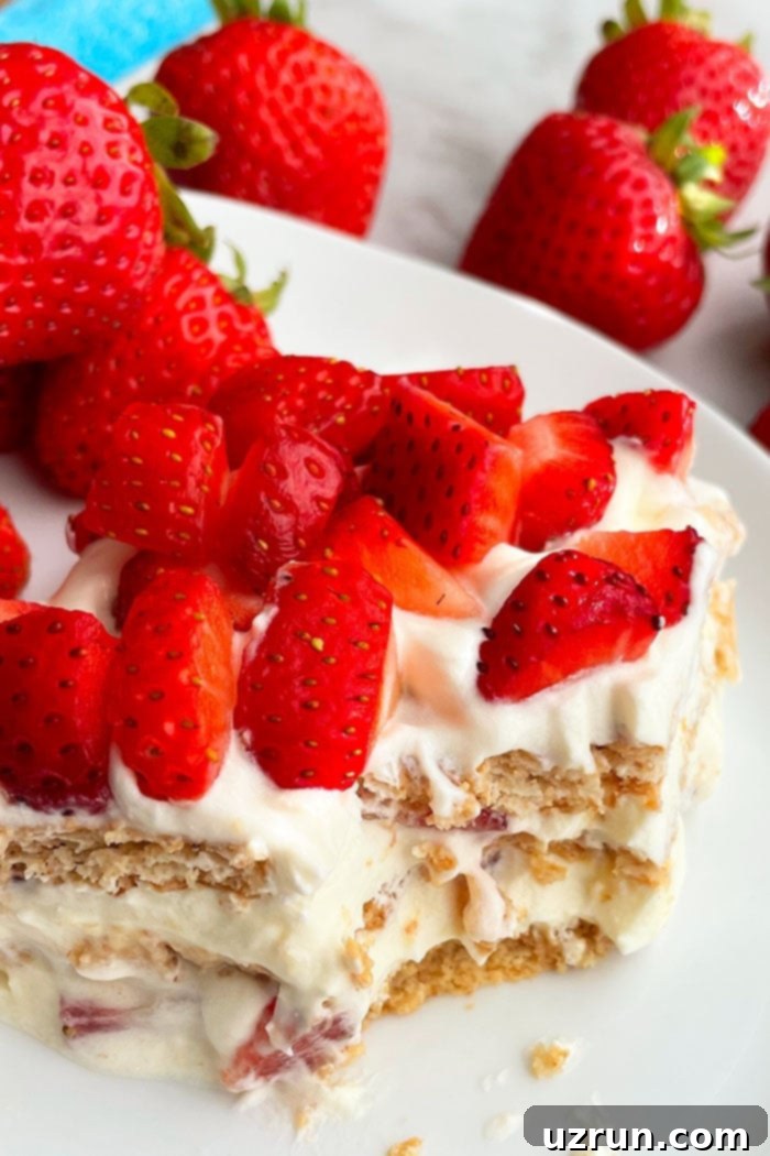 Effortless No-Bake Strawberry Icebox Cake 5 Slice of Easy No Bake Cake With One Spoonful Removed