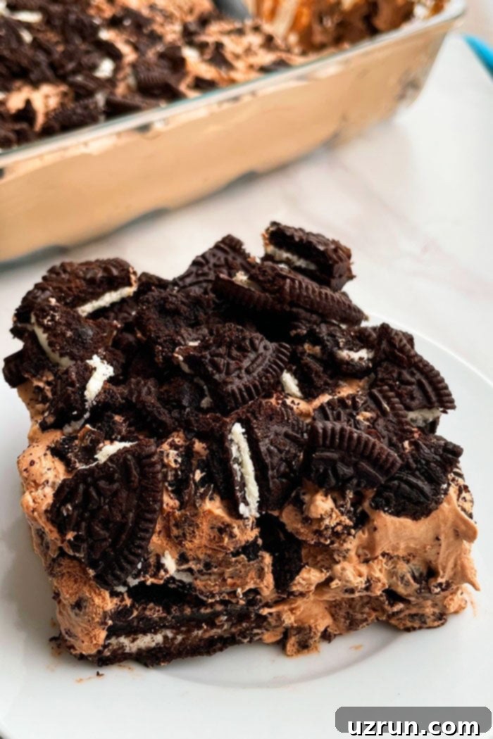 No-Bake Chocolate Oreo Icebox Cake 2 Slice of Chocolate Oreo Refrigerator Cake on White Plate