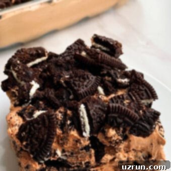 No-Bake Chocolate Oreo Icebox Cake 6 Slice of No Bake Refrigerator Cake (Oreo Chocolate Icebox Cake) on White Plate