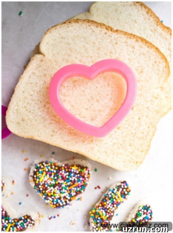 Father's Day Made Easy: Recipes and Sweet Treats 4 Cookie Cutter on Top of Slice of White Bread for making Father's Day Fairy Bread.