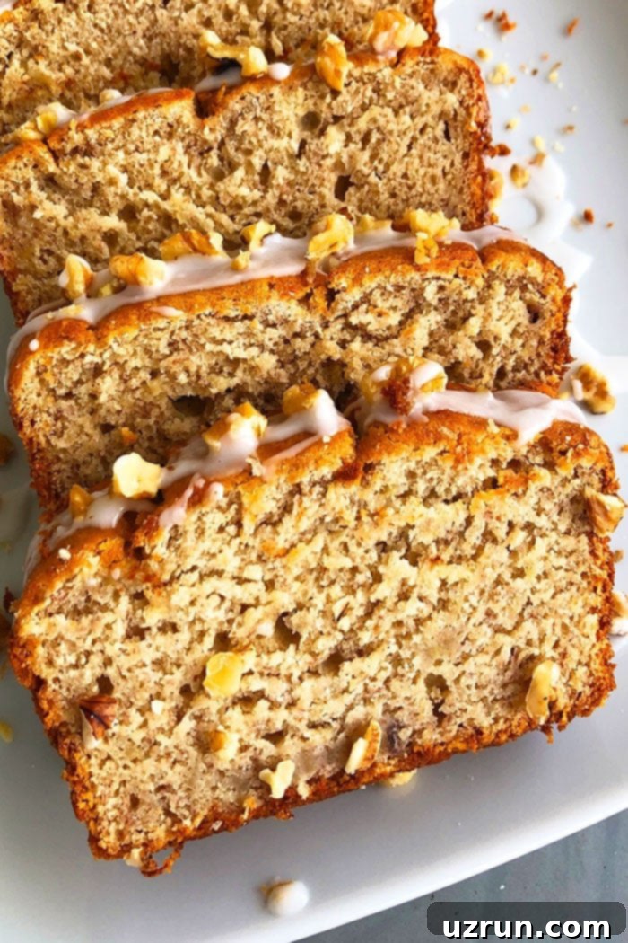 Easy Cake Mix Banana Bread 3 Banana Loaf Slices on White Plate