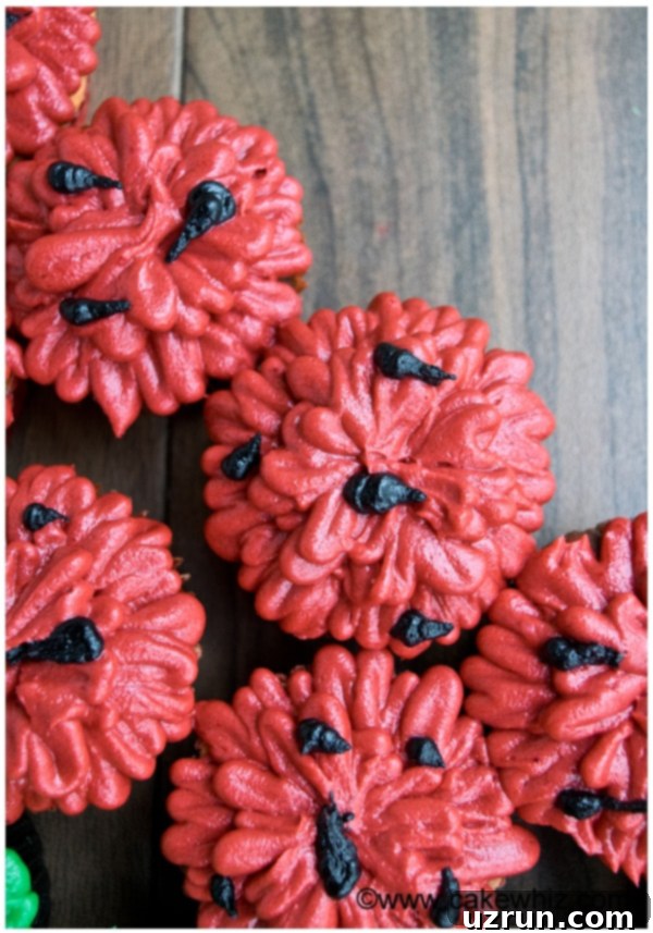 Watermelon Pull Apart Cupcakes 4 Closeup Shot of Red Icing on Top of Summer Cupcakes