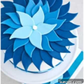 Crafting the Perfect Blue Ombre Cake 5 Easy Ombre Cake Decorated With Blue Fondant on Light Gray Background