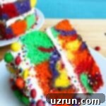 Cake Mix Desserts Made Easy 15 Easy Homemade Rainbow Cake Slice on White Plate With Turquoise Background
