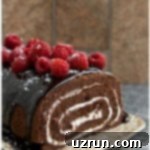 Cake Mix Desserts Made Easy 19 Easy Homemade Chocolate Cake Roll with Chocolate Ganache and Raspberries on Brown Tray