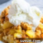 Cake Mix Desserts Made Easy 42 Peach Dump Cake With Cake Mix in White Dish.