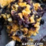 Cake Mix Desserts Made Easy 43 Spoonful of Blueberry Dump Cake (Blueberry Cobbler Dump Cake) in Gray Pan