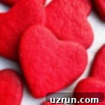 Cake Mix Desserts Made Easy 55 Easy Valentine's Day Red Heart Cookies With Cake Mix on White Parchment Paper