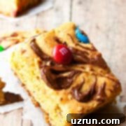 Cake Mix Desserts Made Easy 81 Slices of Easy Cake Mix Cookie Bars on Rustic Wood Background.
