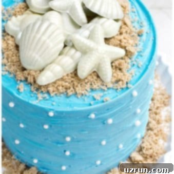 Effortless Coastal Cake 6 Easy Beach Cake on White Cake Stand