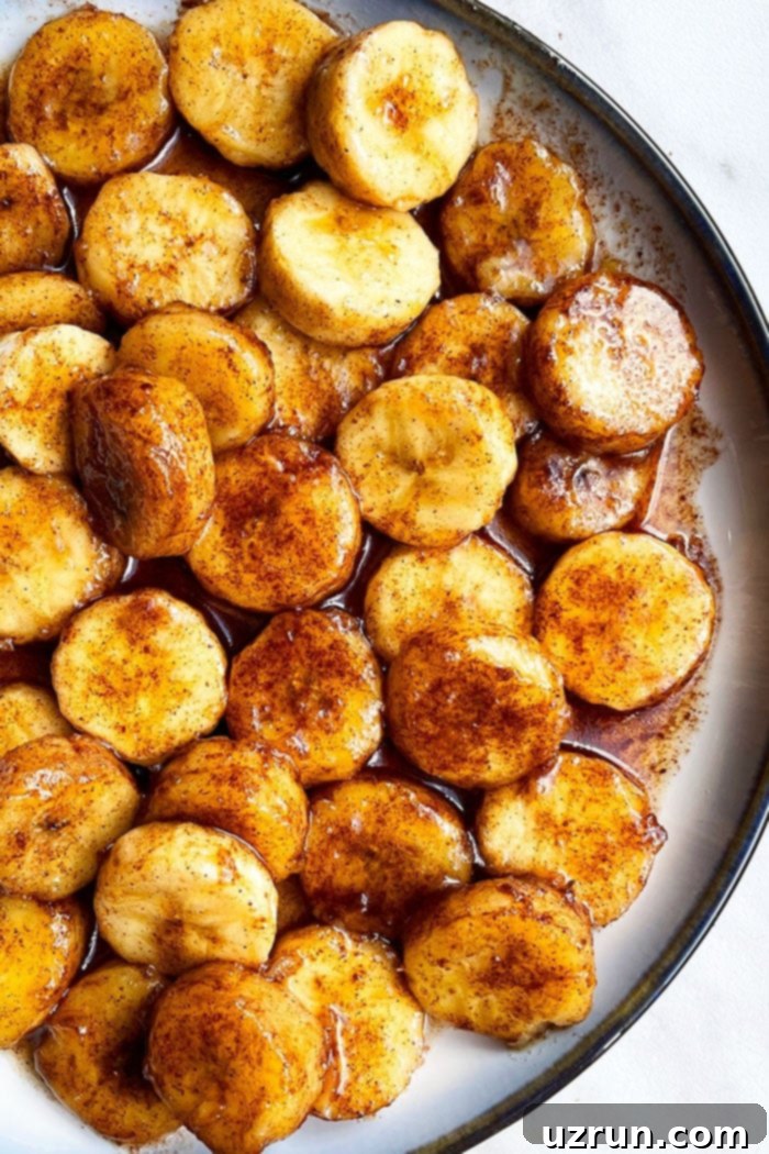 Easy Cinnamon Caramel Bananas 5 Quick Banana Slices With Brown Sugar in White Dish