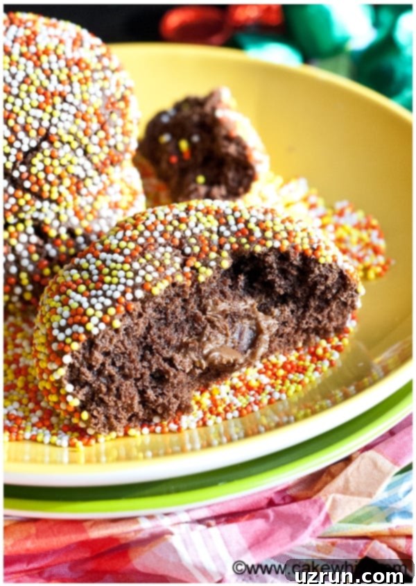 Partially Eaten Chocolate Rolo Cookies on Yellow Plate