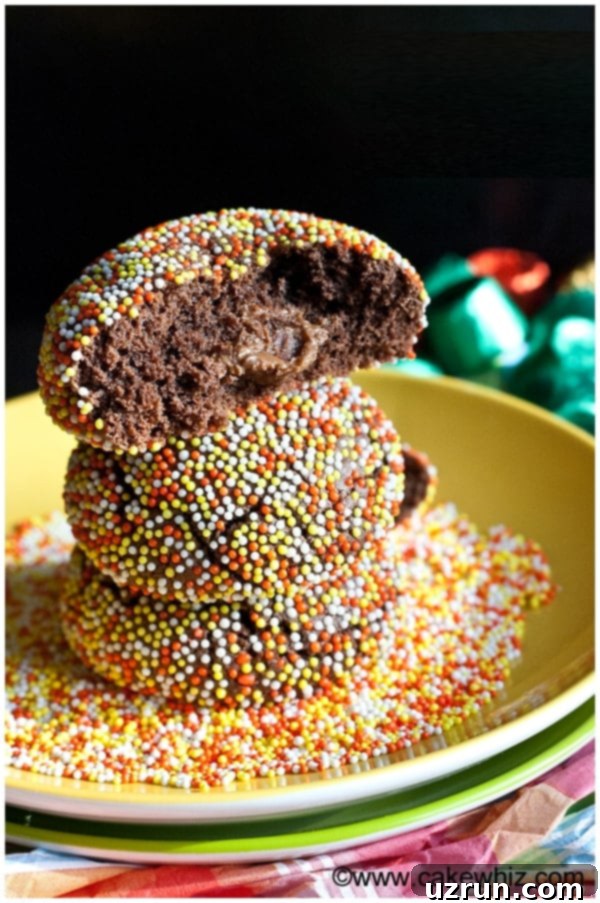 Rolo Stuffed Chocolate Cookies 3 Stack of Stuffed Chocolate Cookies on Yellow Plate
