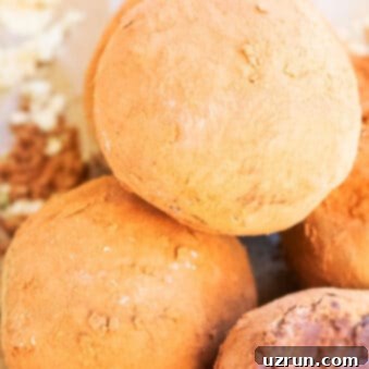 Easy 4-Ingredient Champagne Truffles 6 Stack of Easy Homemade Chocolate Champagne Truffles on Brown Paper