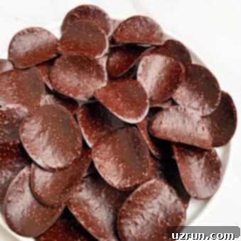 Irresistible Two Ingredient Chocolate Covered Potato Chips 4 Easy Chocolate Covered Potato Chips in White Plate on White Background