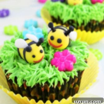 Bumblebee or Honey Bee Cupcakes 6 Easy Fondant Bee Cupcakes (Honey Bee or Bumblebee) with Green Grass Icing on a light yellow background.