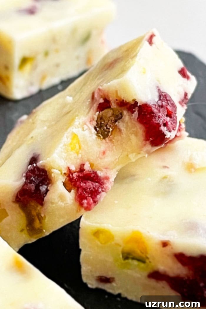 Cranberry Pistachio Condensed Milk Fudge 3 Partially Eaten White Chocolate Fudge With Condensed Milk- Closeup Shot