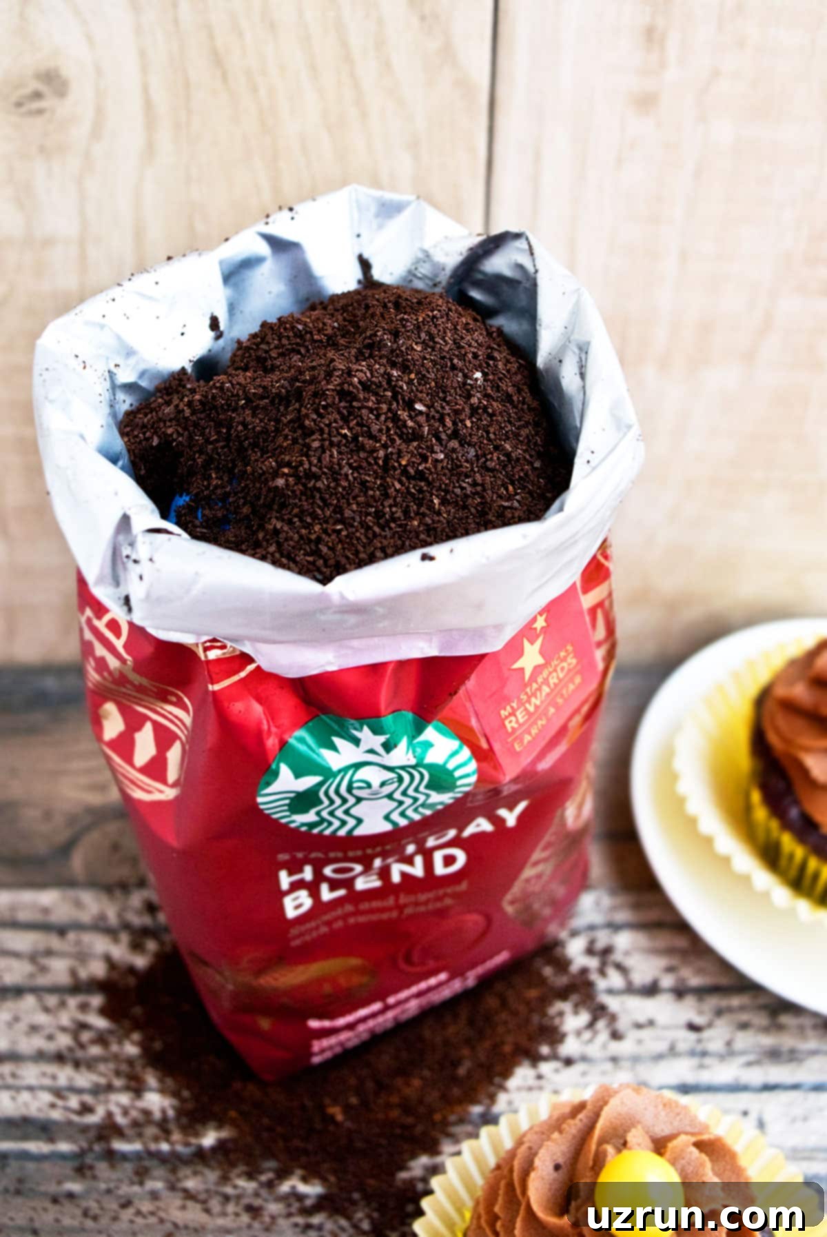Mocha Coffee Cupcakes 6 Opened Bag of Starbucks Coffee on Wood Background.