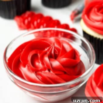 How to Make Red Velvet Frosting 6 Easy Red Frosting (Red Velvet) in Glass Bowl on White Background