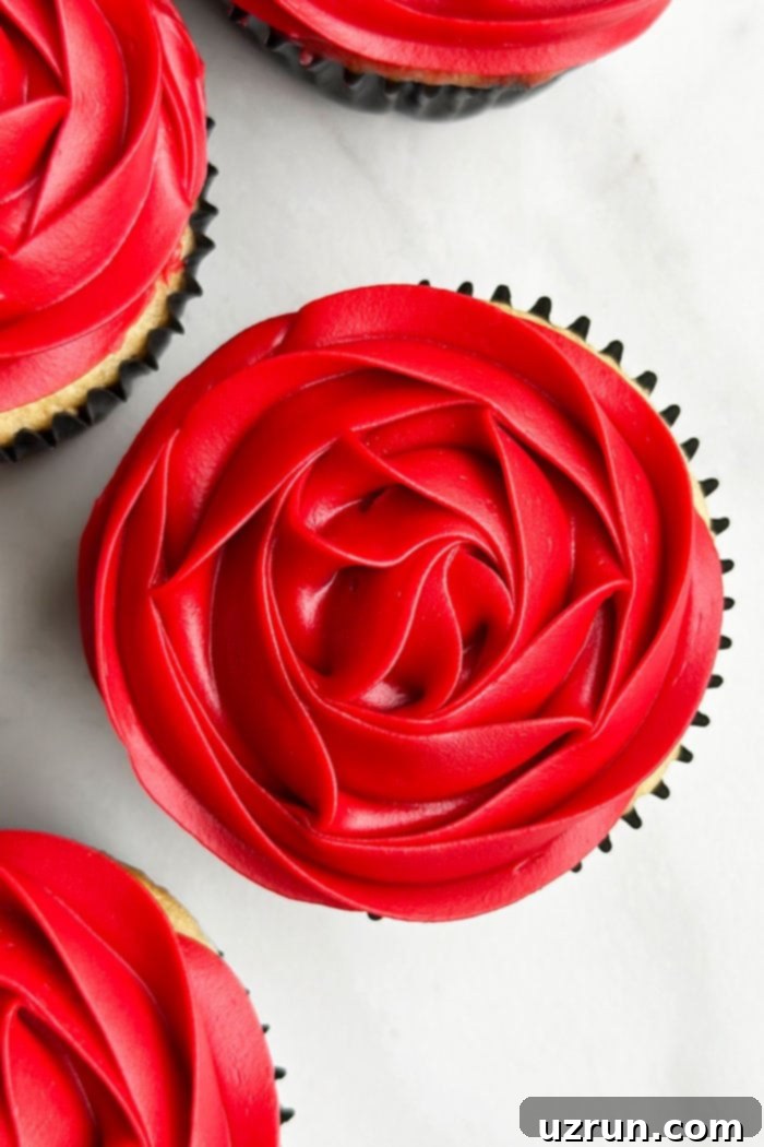 Petal-Perfect Red Rose Cupcakes 3 Red Flower Cupcakes on White Background