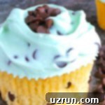 Lucky Green St. Patrick's Day Desserts 6 Delightful Chocolate Chip Cupcakes topped with a vibrant green mint frosting, ready to be enjoyed, showcasing the perfect blend of chocolate and refreshing mint.