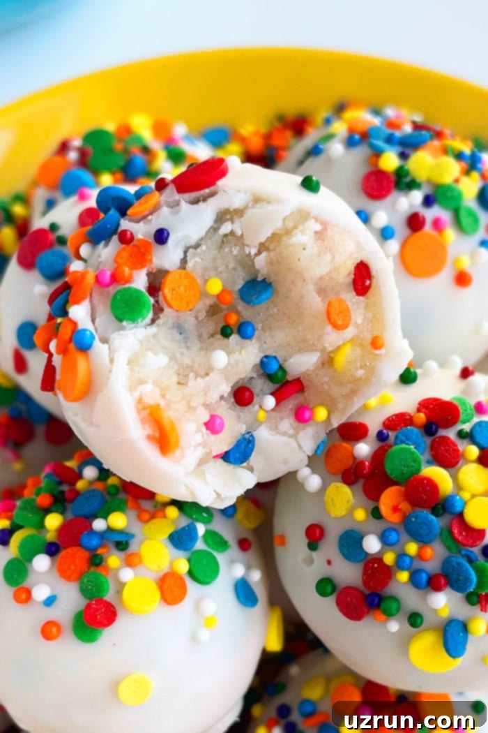 Easy Cake Truffles Made with Cake Mix 4 Closeup Shot of Cake Batter Truffles or Funfetti Truffles With Partial Bite