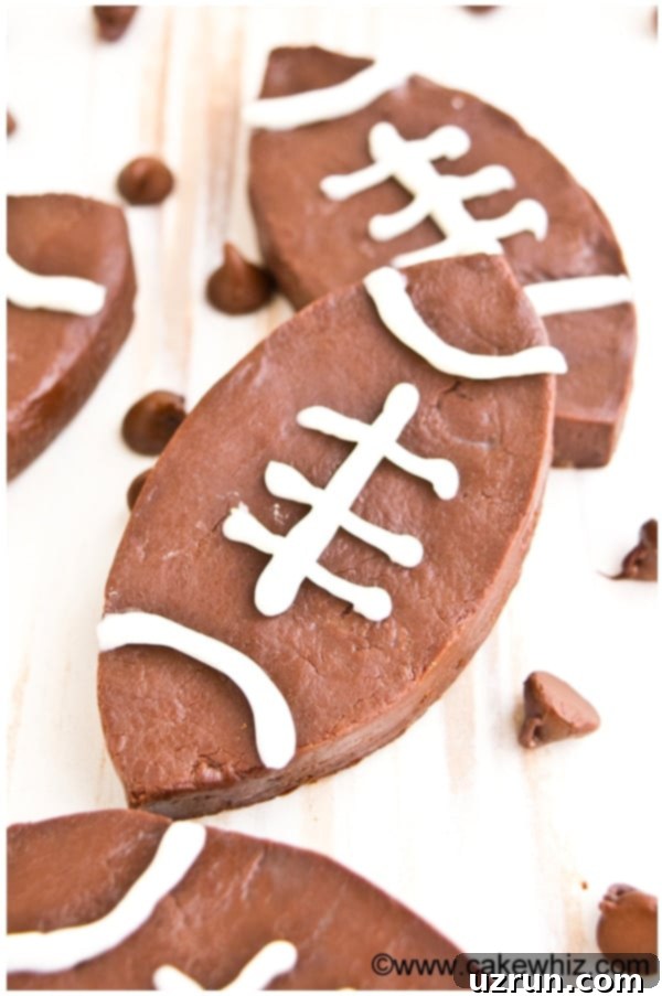 Easy Spicy Chocolate Fudge Footballs on Brown Marble Background. 
