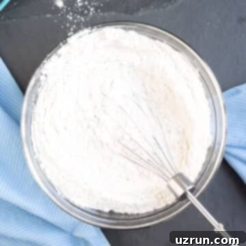 Fluffy Sugar-Free Chocolate Cupcakes 7 Flour and leavening agents whisked together in glass bowl.