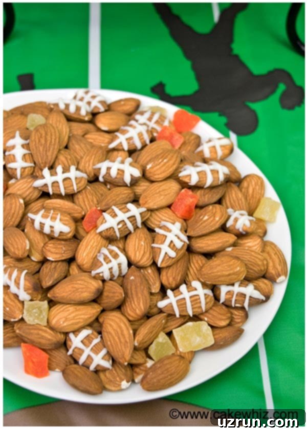 Touchdown Treats: Football Party Cake and Cupcakes 9 White Plate With Almond Footballs