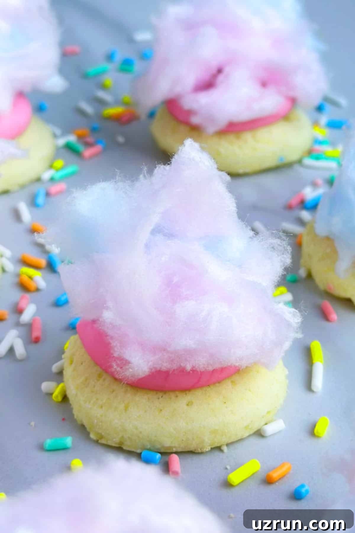 Easy Cotton Candy Cookies on White Marble Background With Sprinkles.
